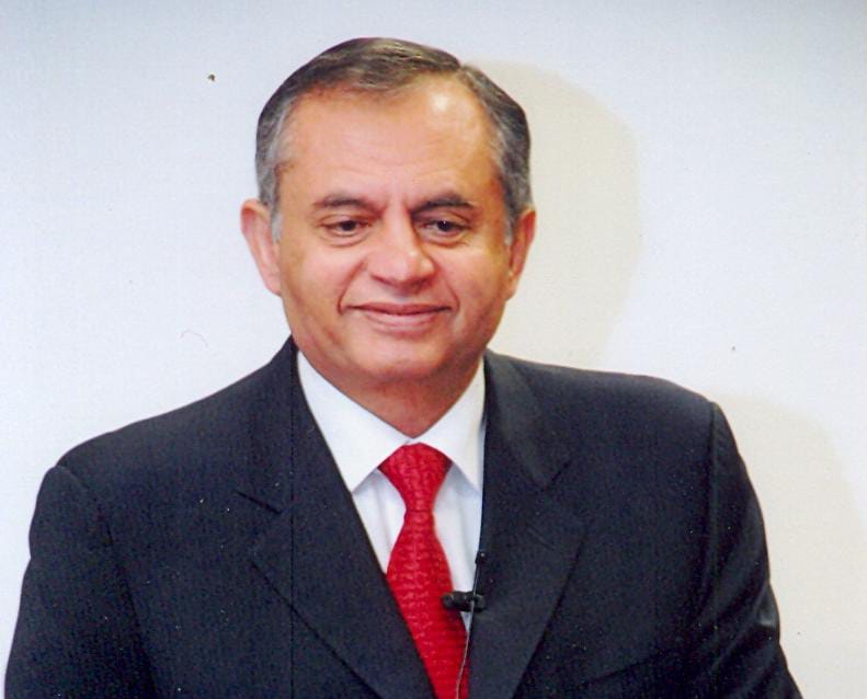  Rizzaq Dawood in an outdoor setting wearing a formal suit
