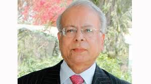  Dr. Ishrat Husain in an outdoor setting wearing a formal suit
