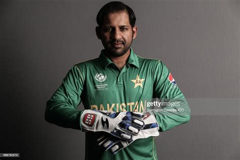  Pakistani wicketkeeper Sarfraz Ahmed posing confidently in green team jersey