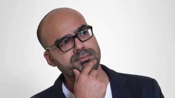 Junaid Akram smiling