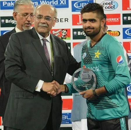 Babar Azam receiving a trophy