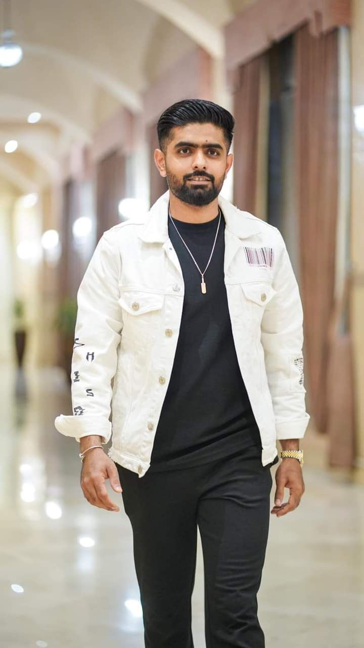 Babar Azam wearing a stylish white jacket