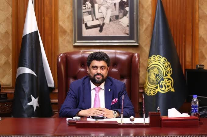 Kamran Tessori official portrait in elegant Blue Suit