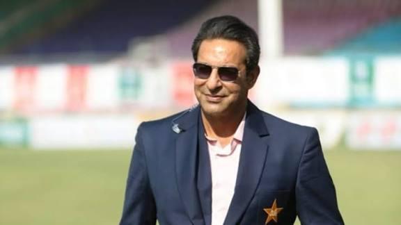 Wasim Afridi posing confidently for a portrait photo