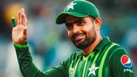 Babar-Azam smiling warmly while posing for the camera