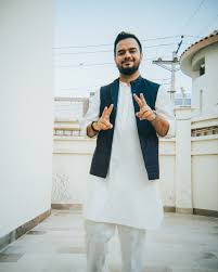 Irfan Junejo in a formal studio portrait session