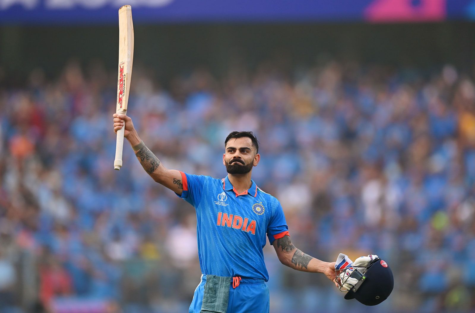 Virat Kohli celebrating a memorable moment in a cricket match
