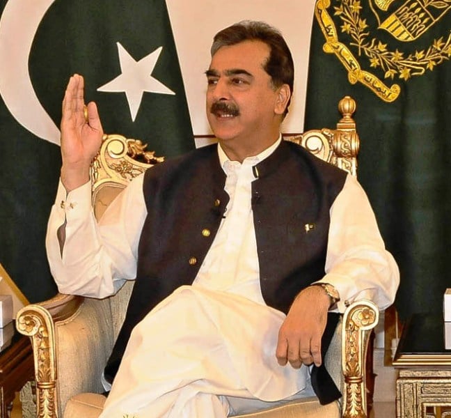 Former Prime Minister Yousaf Raza Gillani speaking at a press conference