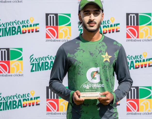 Sameer Ahmad Minhas standing confidently, Pakistani cricketer and sportsman