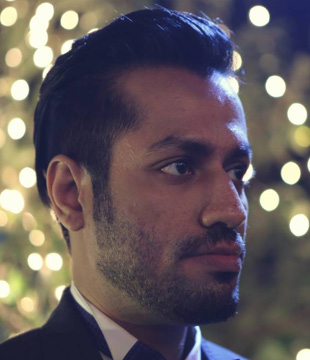 Saqib Khan, a director, radiating presence in a formal outfit
