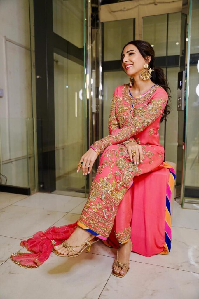 Ushna Shah in pink and gold embellished outfit