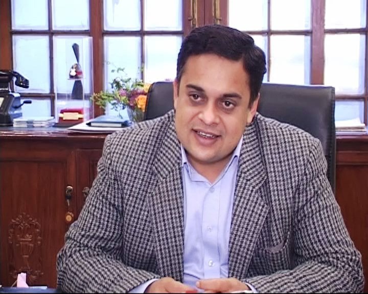 Ahad Khan Cheema official portrait in professional attire