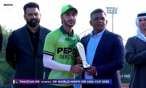 Sameer Ahmad Minhas standing confidently, Pakistani cricketer and sportsman