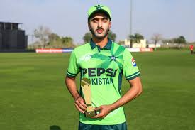 Sameer Ahmad Minhas standing confidently, Pakistani cricketer and sportsman