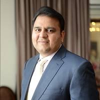  Fawad Chaudhry, Pakistani politician and former Federal Minister, smiling at an event
