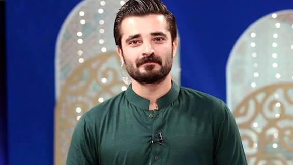 Hamza Ali Abbasi speaking passionately at an event
