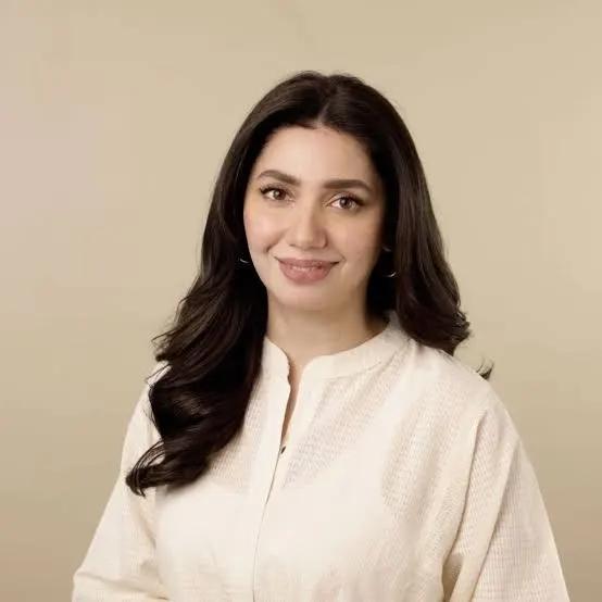 Mahira Khan smiling in a soft, elegant portrait