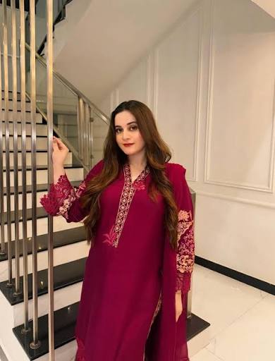  Aiman Khan, renowned Pakistani actress, in a professional profile photograph
