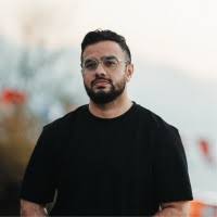  Irfan Junejo, renowned Pakistani YouTuber and content creator, in a professional profile photograph
