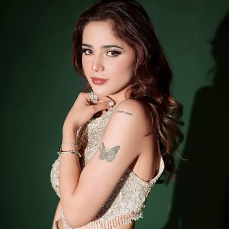  Aima Baig, renowned Pakistani singer and performer, in a professional profile photograph
