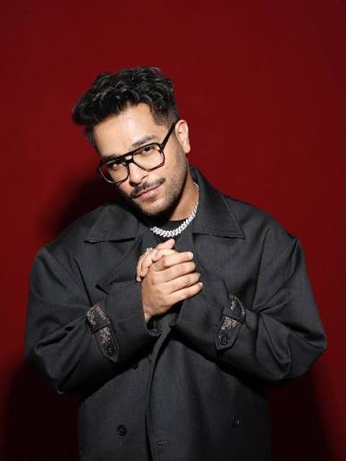  Asim Azhar, renowned Pakistani singer and songwriter, in a professional profile photograph
