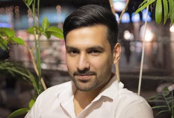  Zaid Ali, renowned Pakistani YouTuber and digital content creator, in a professional profile photograph
