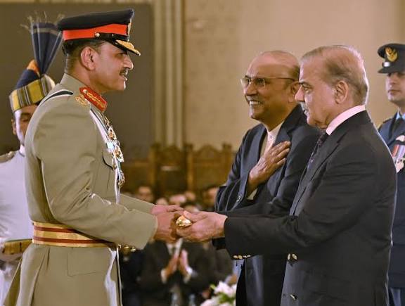 General Asif Munir, senior Pakistani military officer, receiving the Hilal-e-Jurat medal
