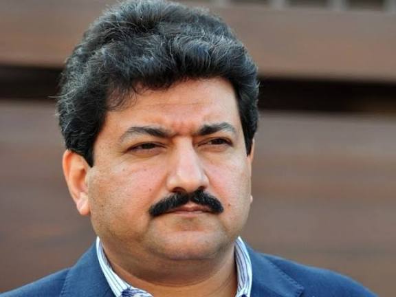  Hamid Mir, renowned Pakistani journalist and television anchor, in a professional profile photograph
