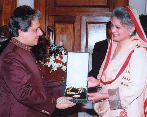 Young Musarrat Misbah, Pakistani actress and public figure, receiving a medal in an old photograph