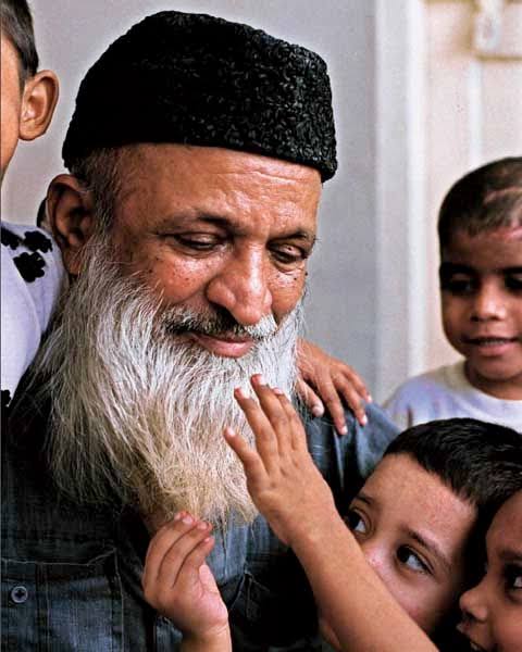 Abdul Sattar Edhi, Pakistani philanthropist, with children at a charitable event