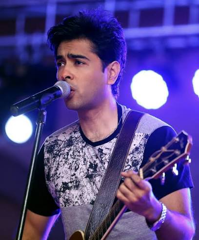Shehzad Roy, Pakistani singer and social activist, singing on stage during a live performance