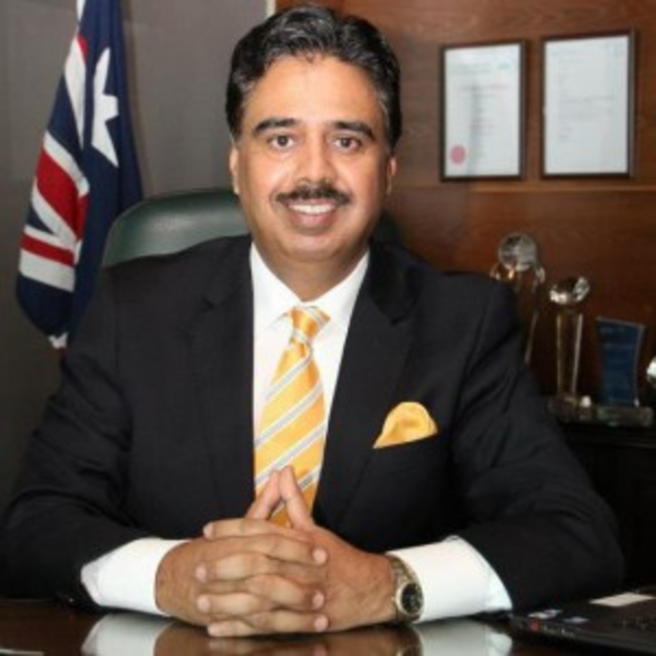 Saleem Ghauri official portrait in professional attire